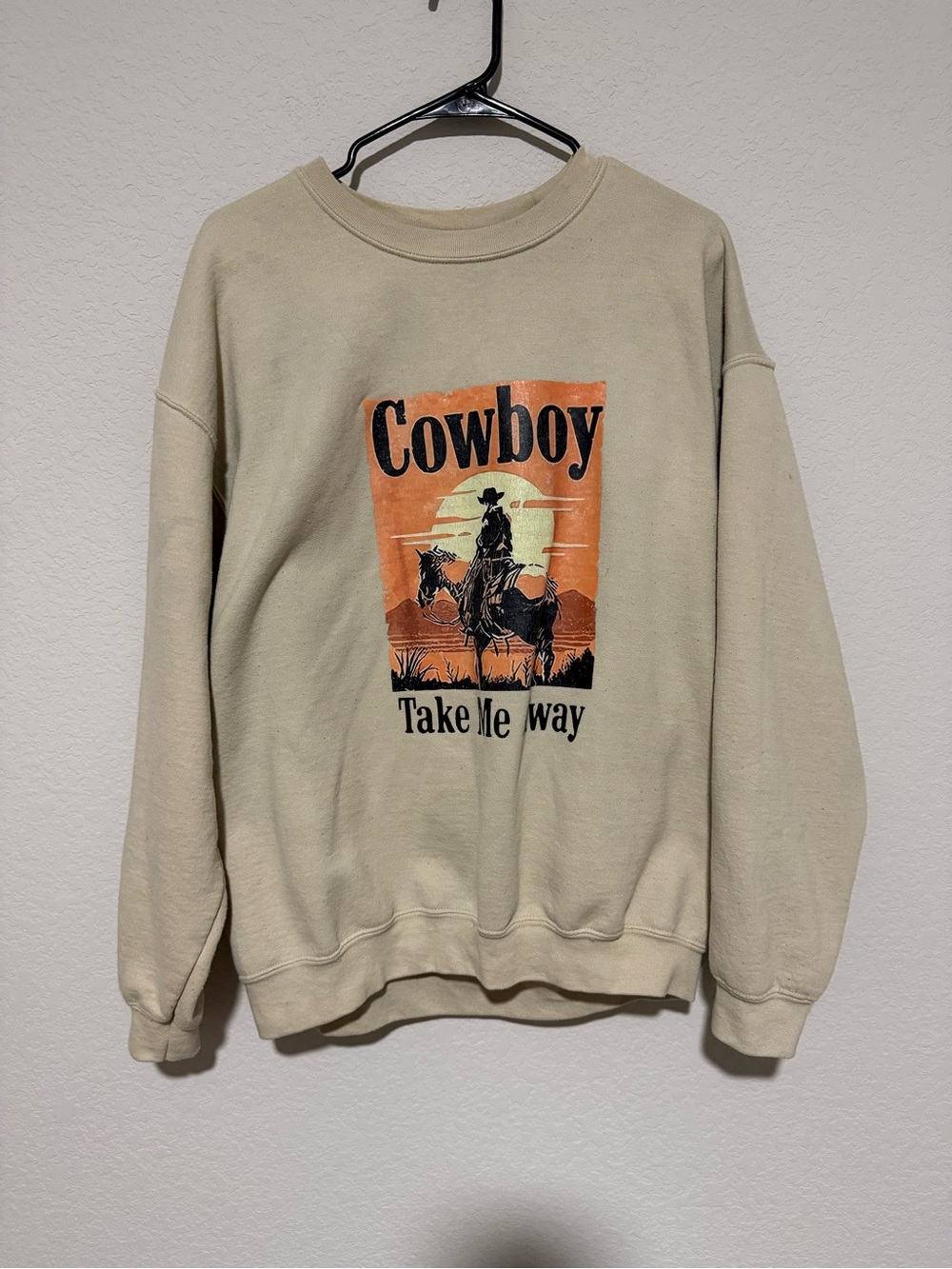 Gildan Beige Crewneck Sweatshirt with Orange & Black Cowboy Graphic